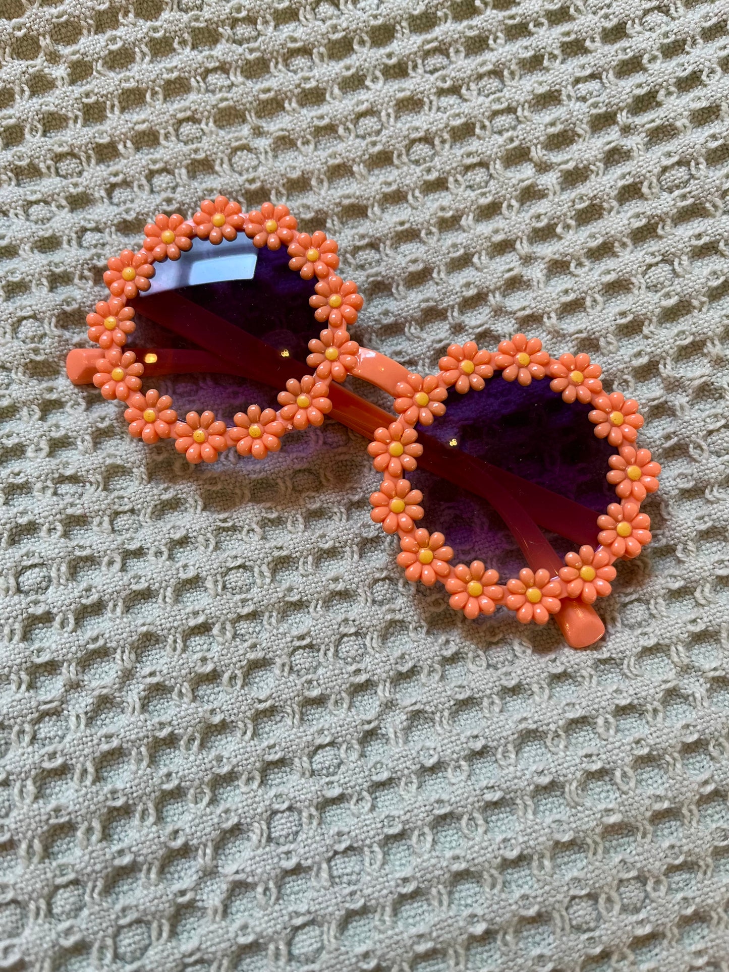 Kinderzonnebril oranje bloemetjes
